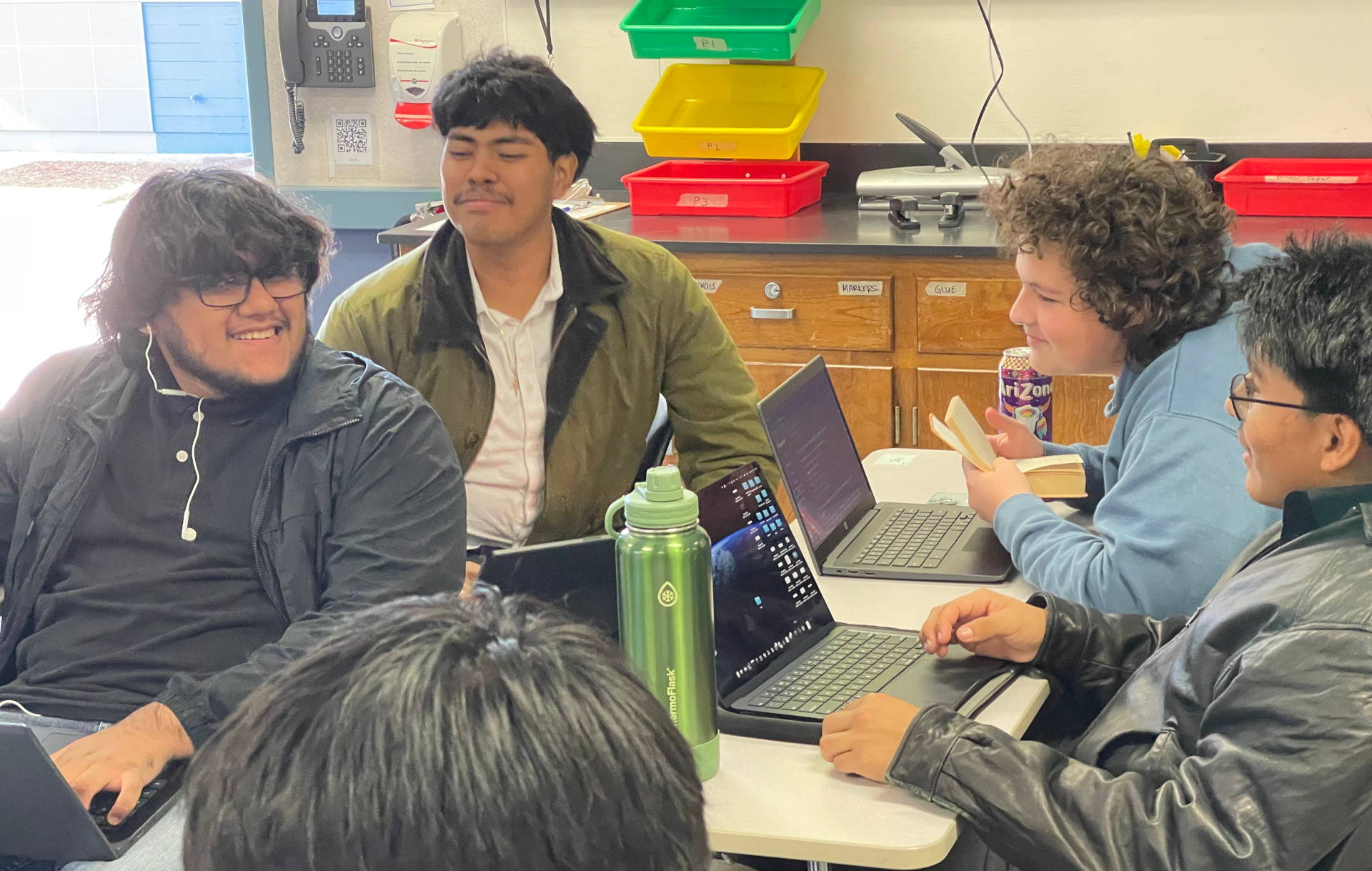 Group of Rancho students hanging out and programming